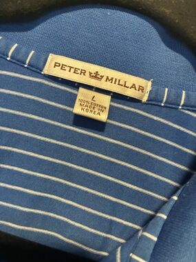Peter Millar blue striped polo shirt with Ritz-Carlton Golf Club Orlando embroid